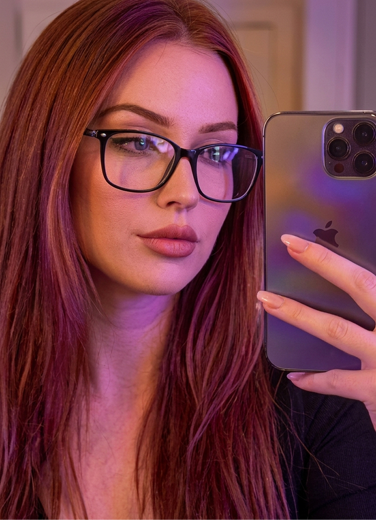 Creator in a pink top